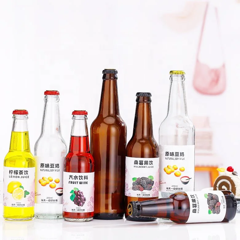 Stocked 330ml clear transparent amber empty sparking soda water carbonate beverage cocktail breezer beer glass bottle with lid