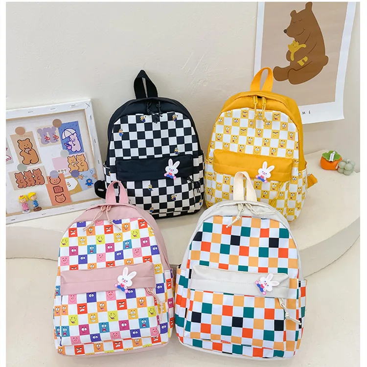 Kindergarten student schoolbag new Korean fashion lattice boy girl baby foreign style light travel backpack