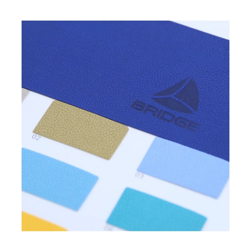 Custom Printing Color Change 0.7mm Nonwoven Coagulated Emobssing Waterproof PU Leather Fabric For Notebook Jean Label