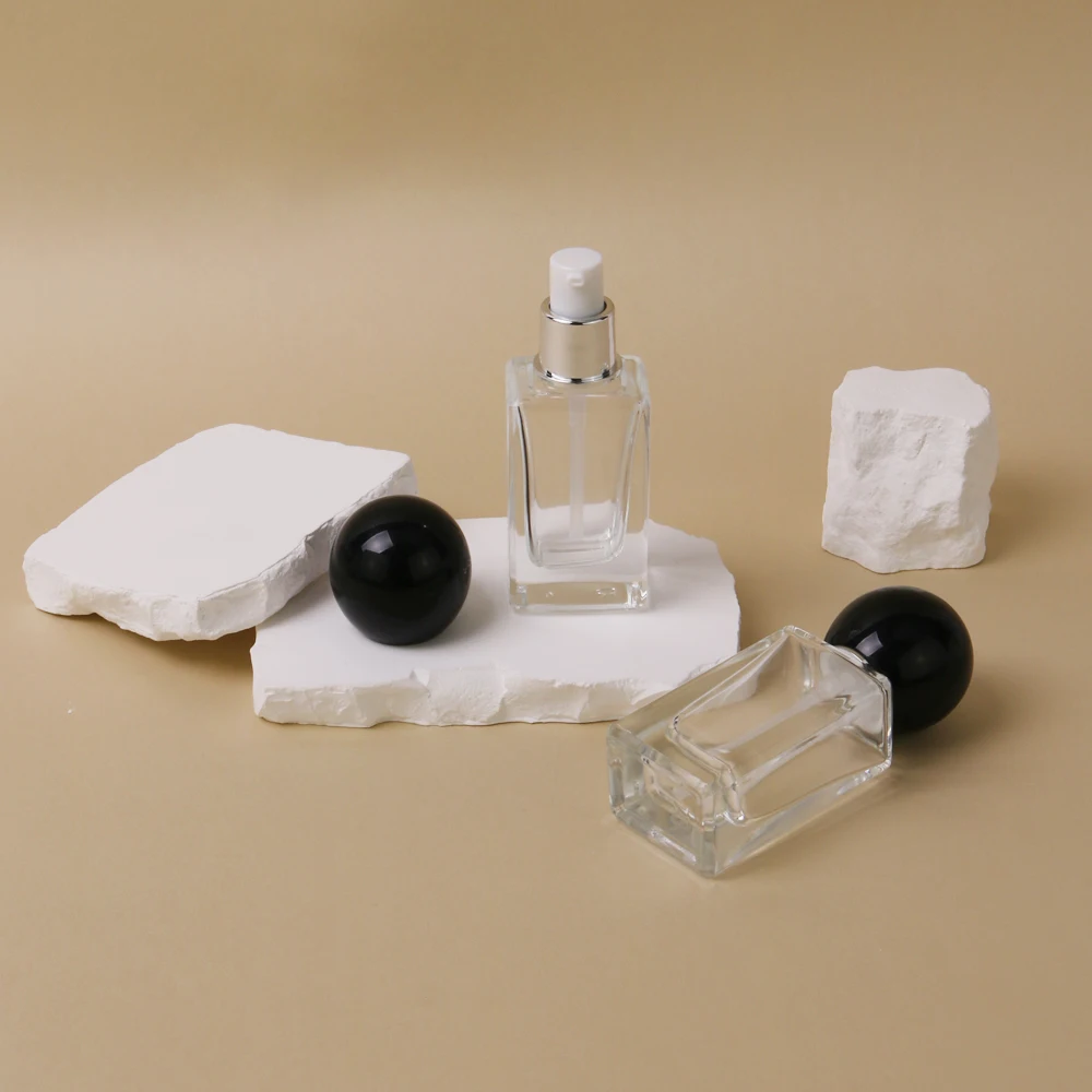 30ml 50ml 100ml 120ml Custom Transparent Cosmetic Skincare Glass Bottles Lotion Packing Pump Bottle With Ball Shape Lid