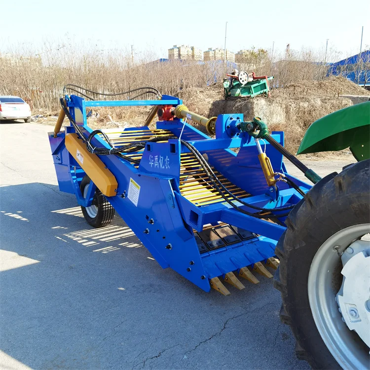 Small stone picker machine clear land and open up wasteland collect and recycle debris and lumps