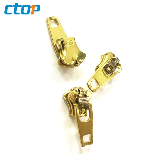 Wholesale YG brass spring lock sliders zipper puller zipper head custom jeans zipper slider