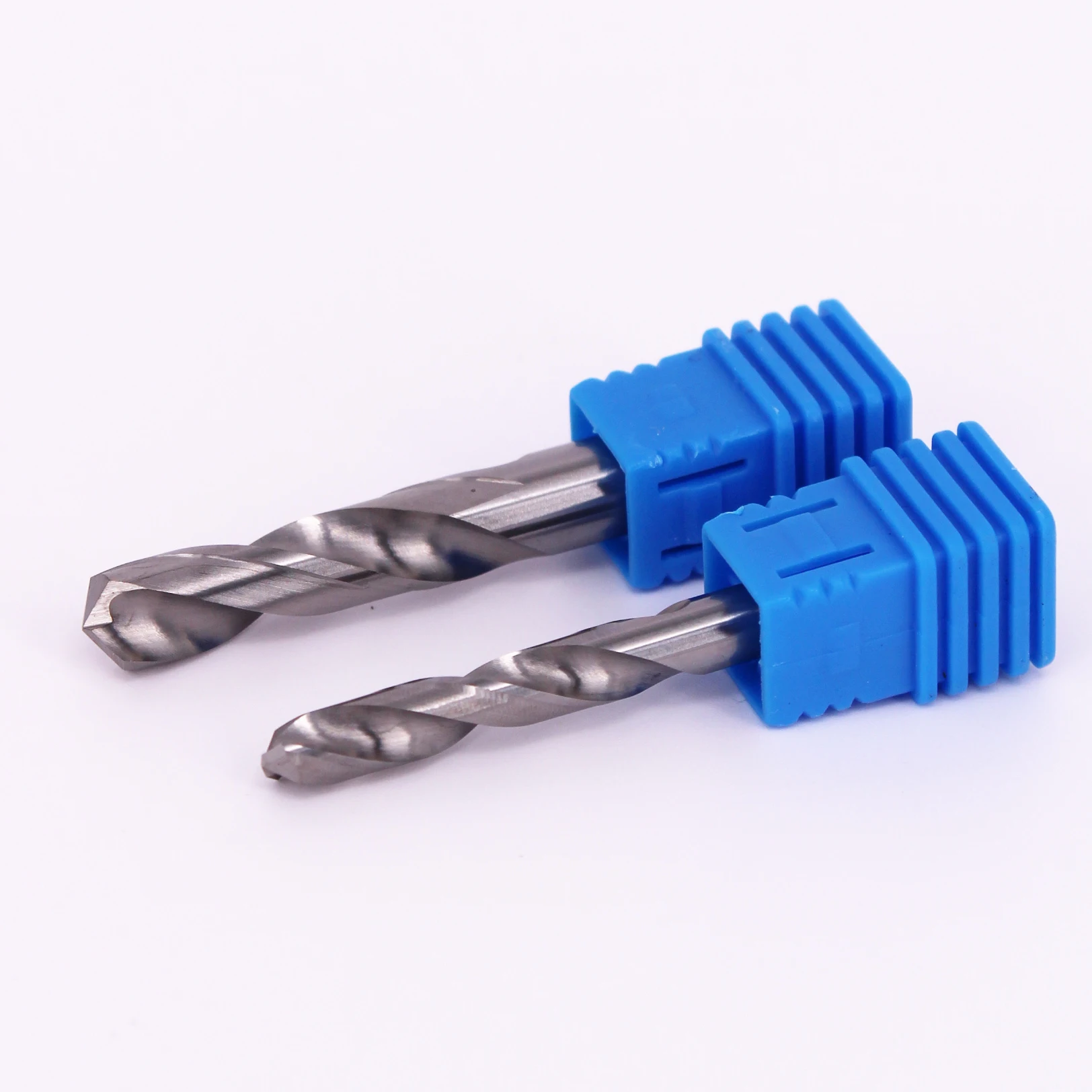 Solid tungsten carbide drill bit for drilling carbide drill bits