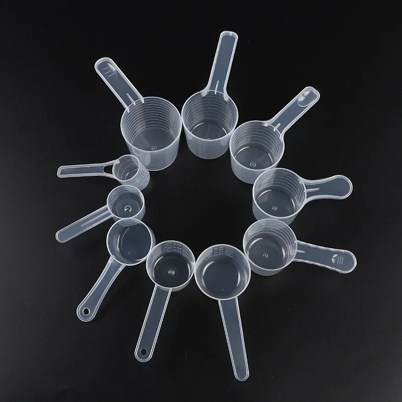 Clear measuring spoon with scale for liquid or powder  food grade PP spoon new product ideas 2024