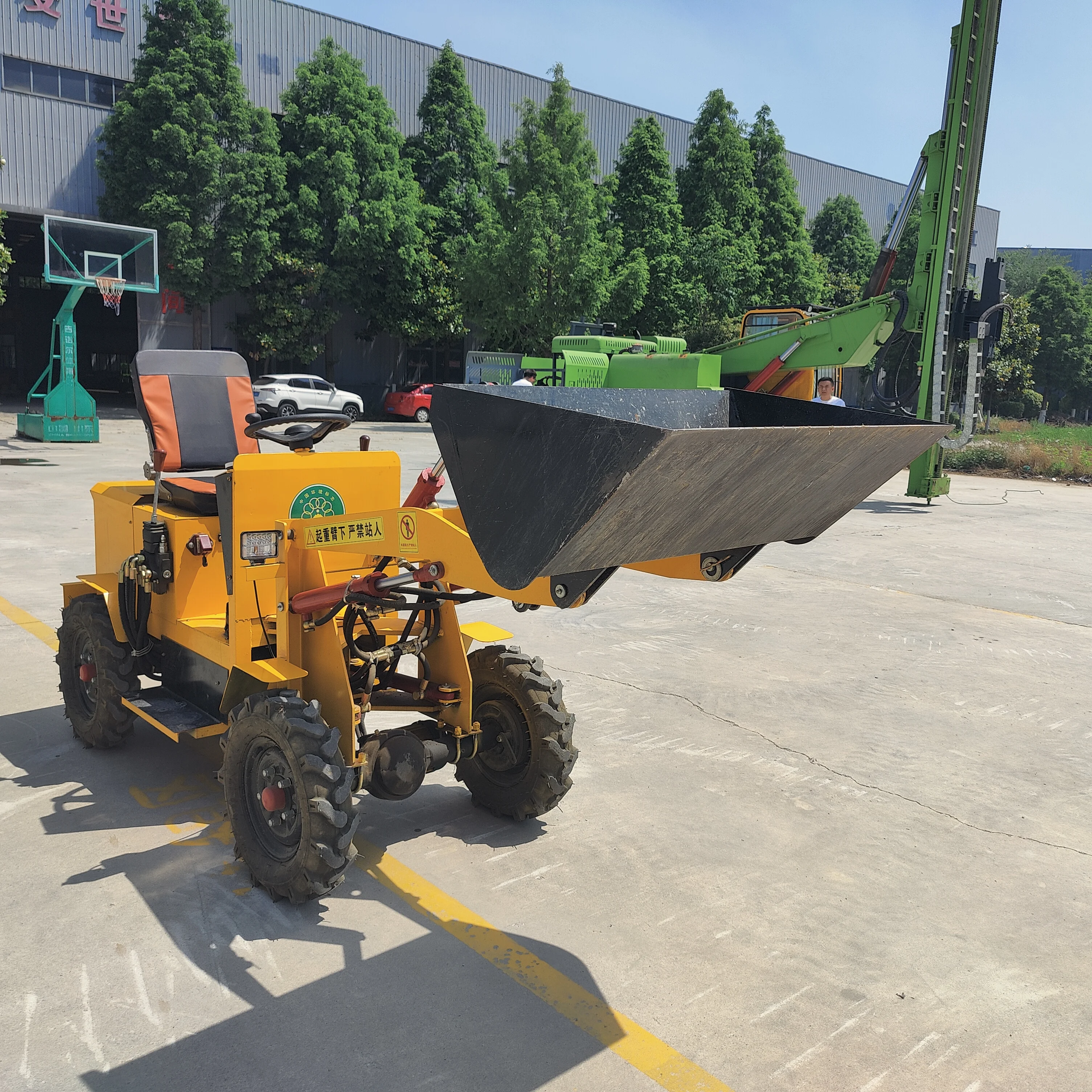 Jining Hongrun multi-functional small electric front-end loader and telescopic articulated mini four-wheel loader