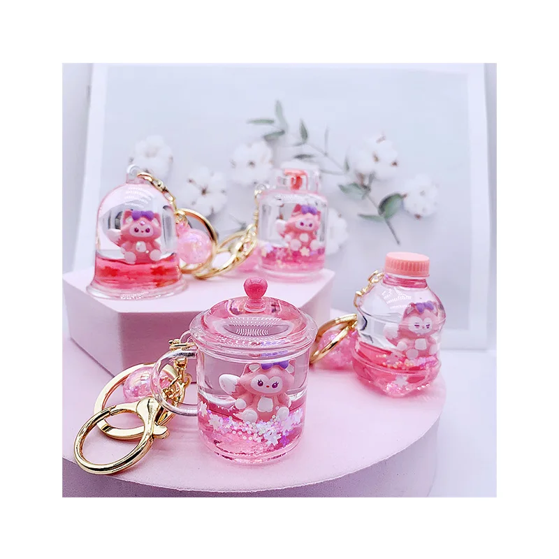 High Quality Cute Quicksand Liquid Cartoon Bell Key ring Liquid Keychain In Oil Cute Pink Fox Key Chain