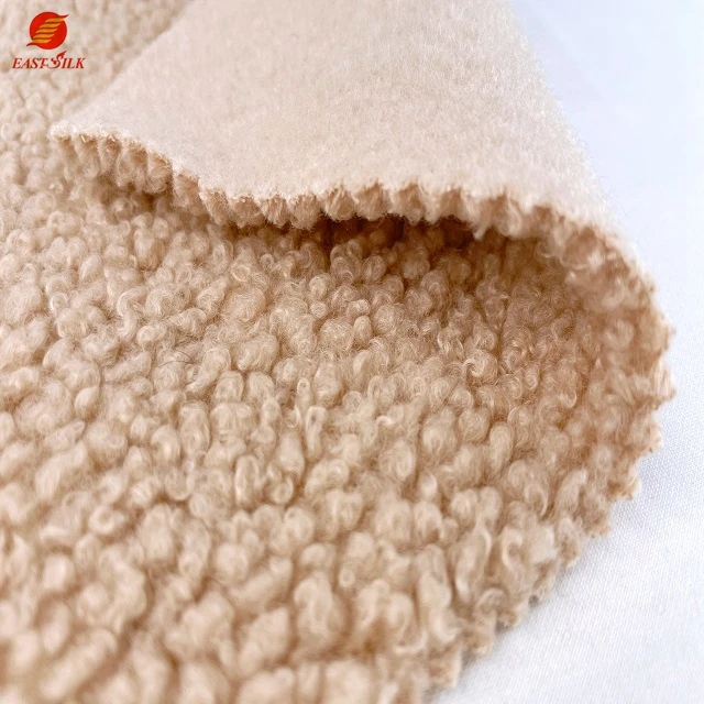High quality 100% polyester polar fleeced fluffy fabric Knitted sleepwear poly super soft fleece bonded fabric for coat