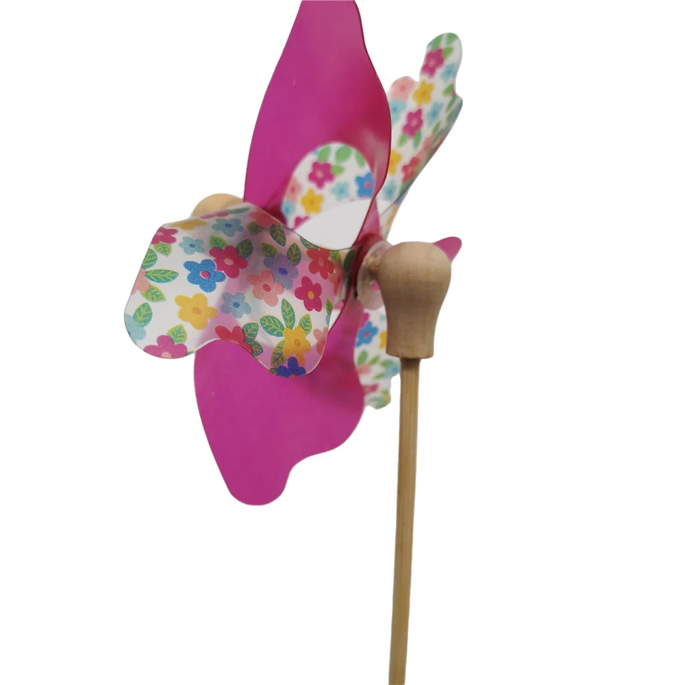 
children hand carry windmills for national day holiday party festival play fun toy 
