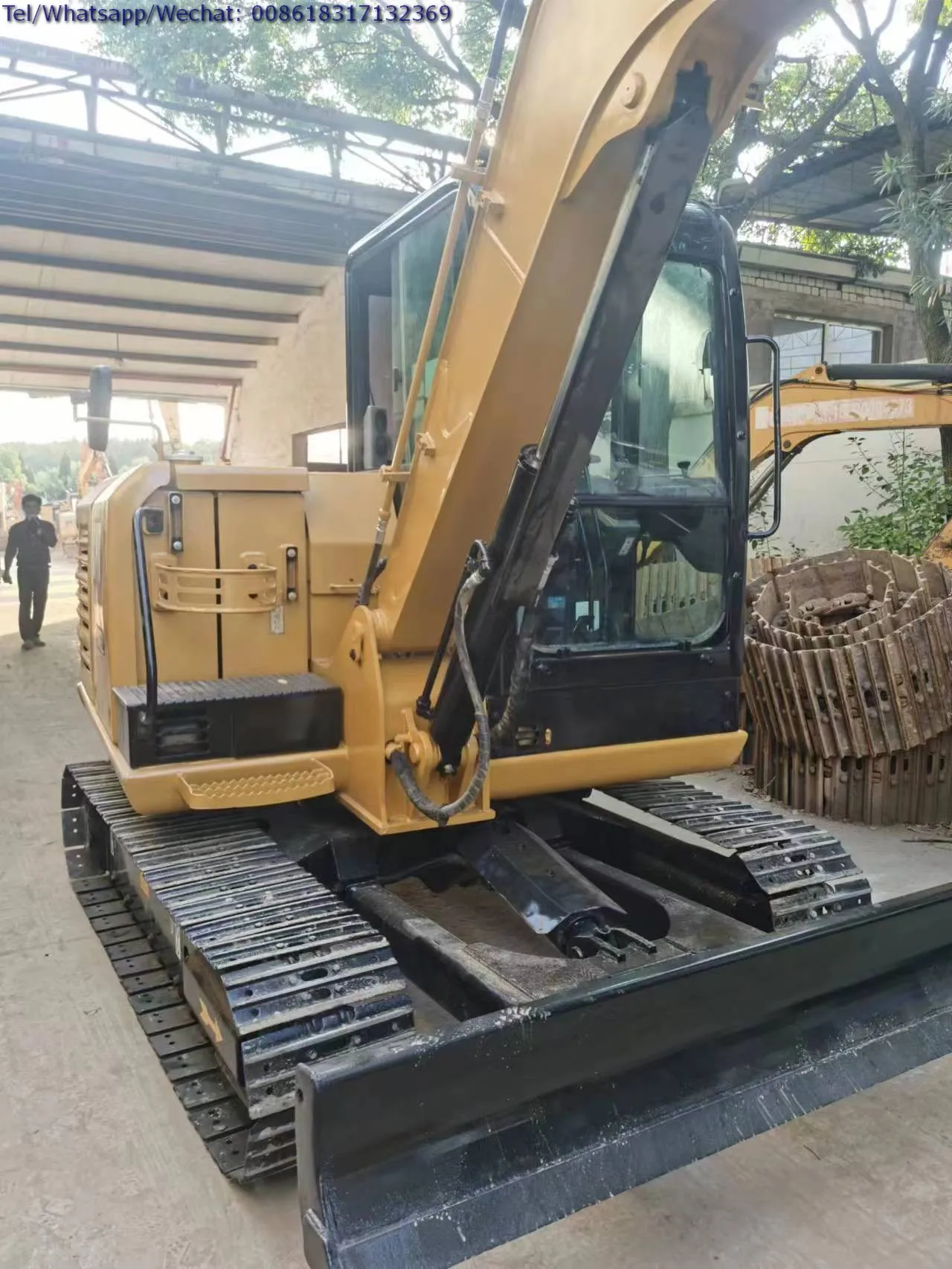 Мини-экскаватор Cat 306 306E с резиновой направляющей