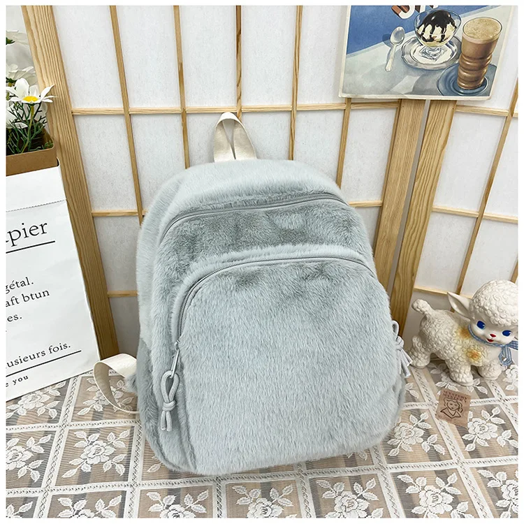 Autumn and winter school bag female plush backpack Korean version high school students solid color simple leisure backpack