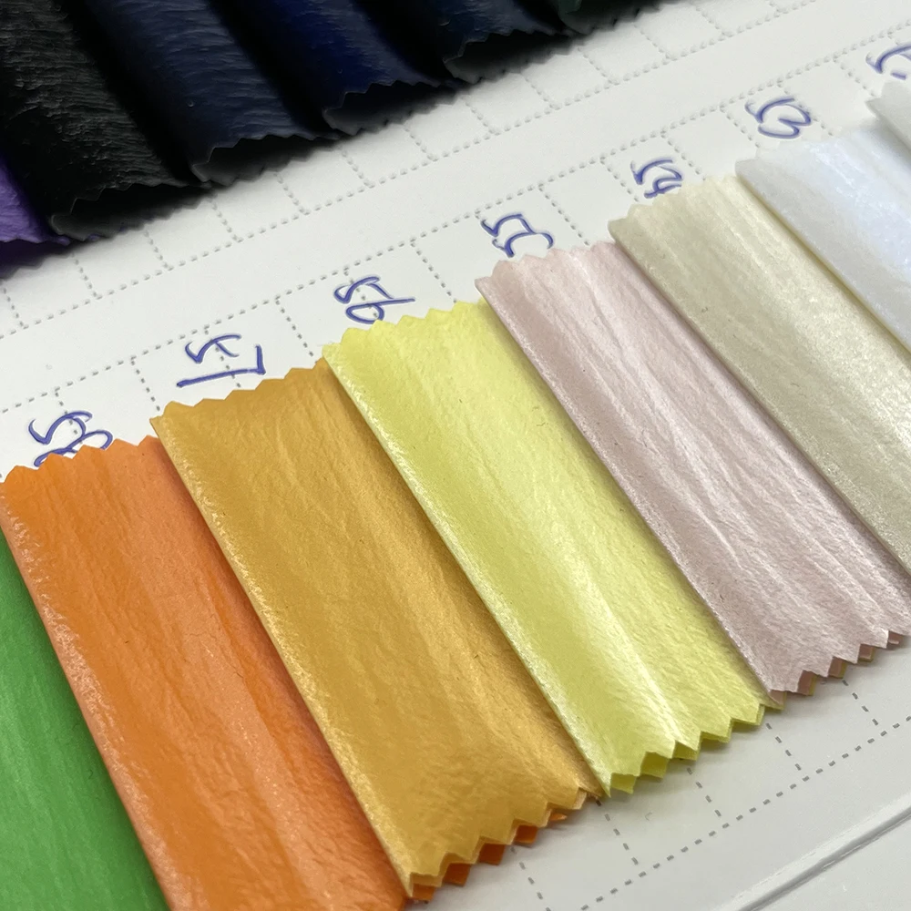 high quality golden bronzed fabric for raincoat nylon fabric taffeta waterproof downproof puffer jacket