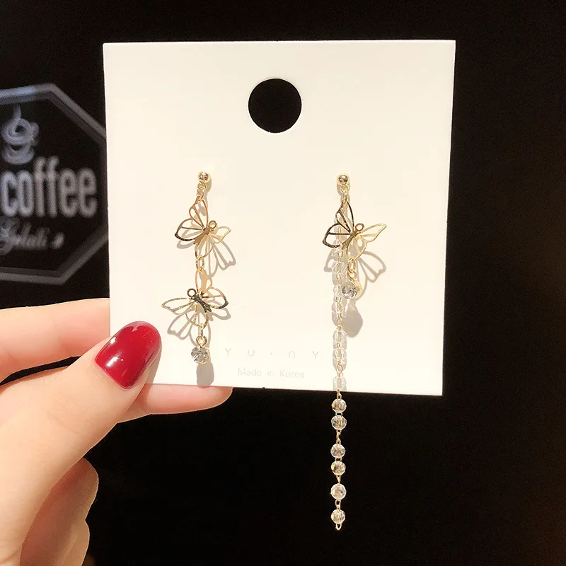 Han Jue jewelry factory thin Bow Earrings female long style asymmetric tassel high sense Korean Earrings