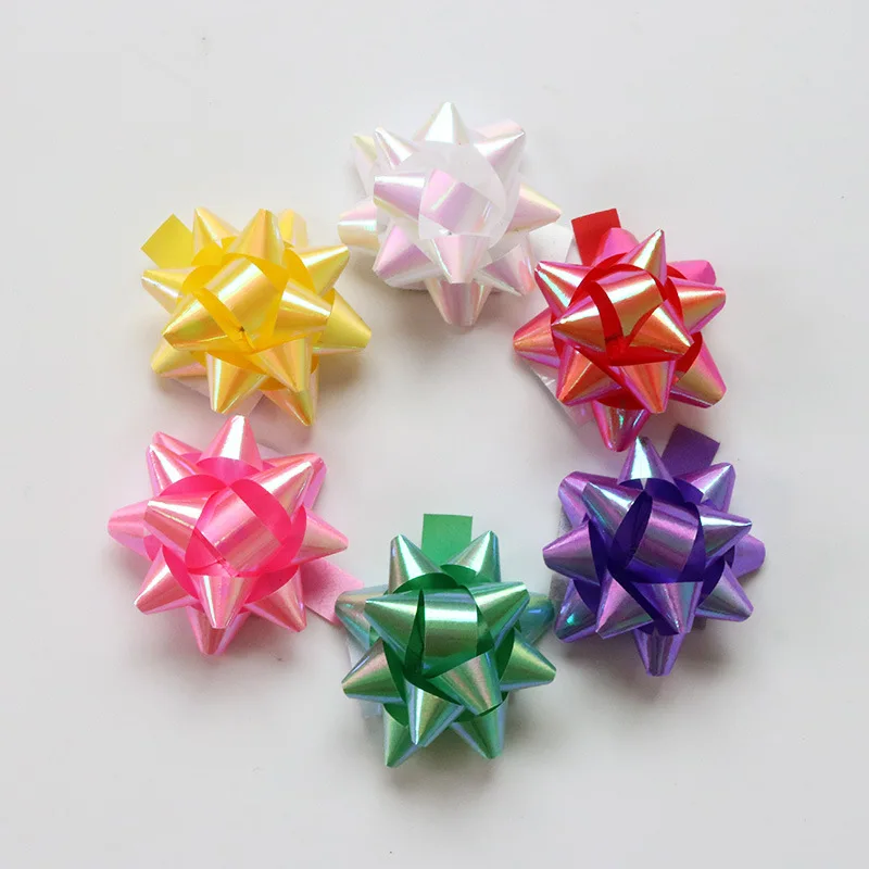 Разноцветные ленты с бантом в виде звезд для подарочной упаковки