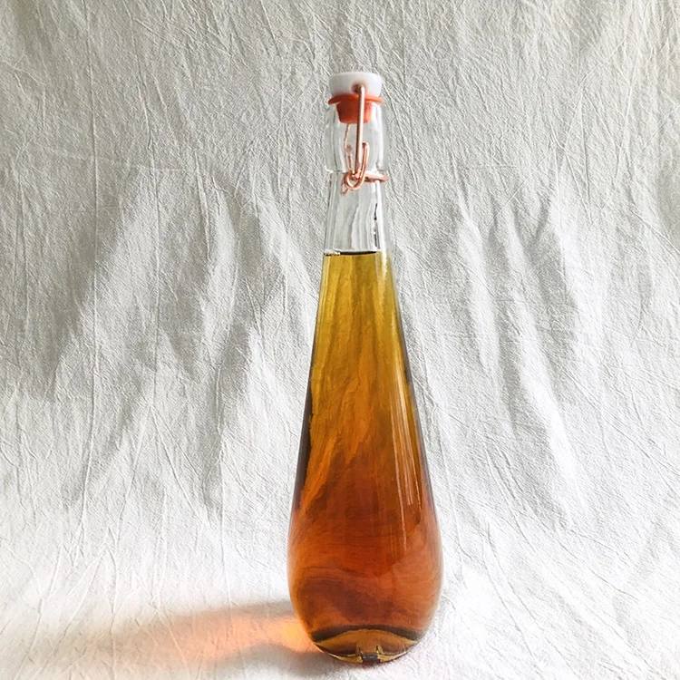 Tear Drop Shape 500ml Clear Water Drinking Reusable Glass Bottle with Swing Top