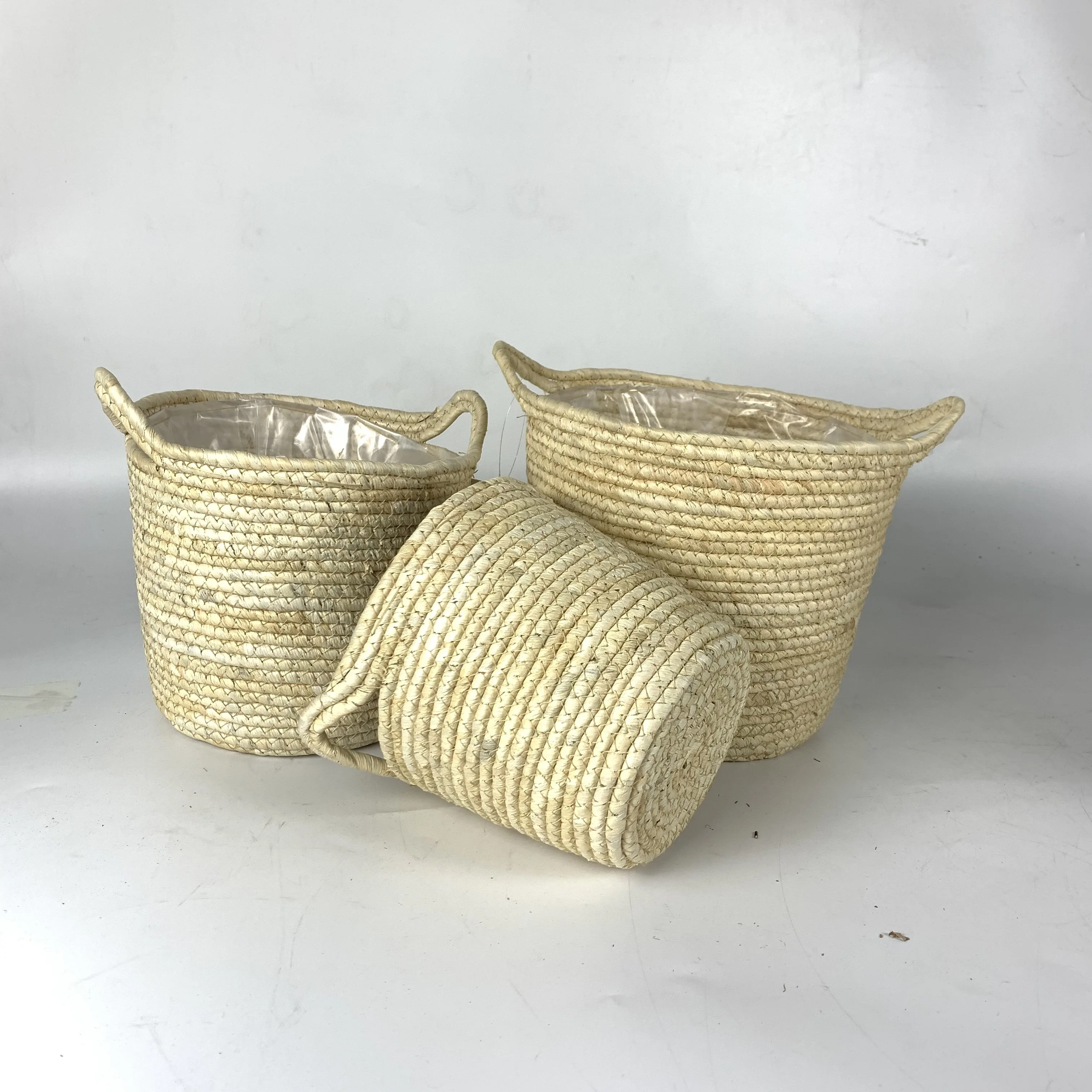 New design wholesale outdoor grass weaved baskets artificial plant flower pot for decoration