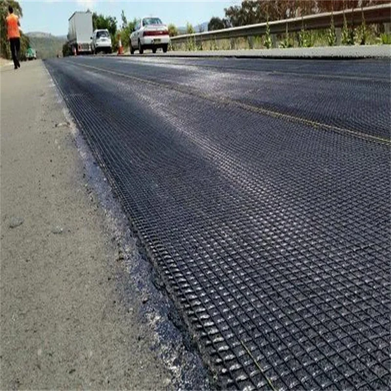 30 60 150KN Bitumen Coating Road  Fiberglass Geogrid Asphalt Reinforcement asphalt coated fiberglass geogrid composite geotex