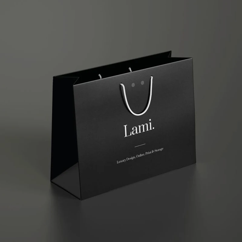 Wholesale custom luxury black Clothes store retail packaging gift carry bags boutique shopping paper bags with your own logo