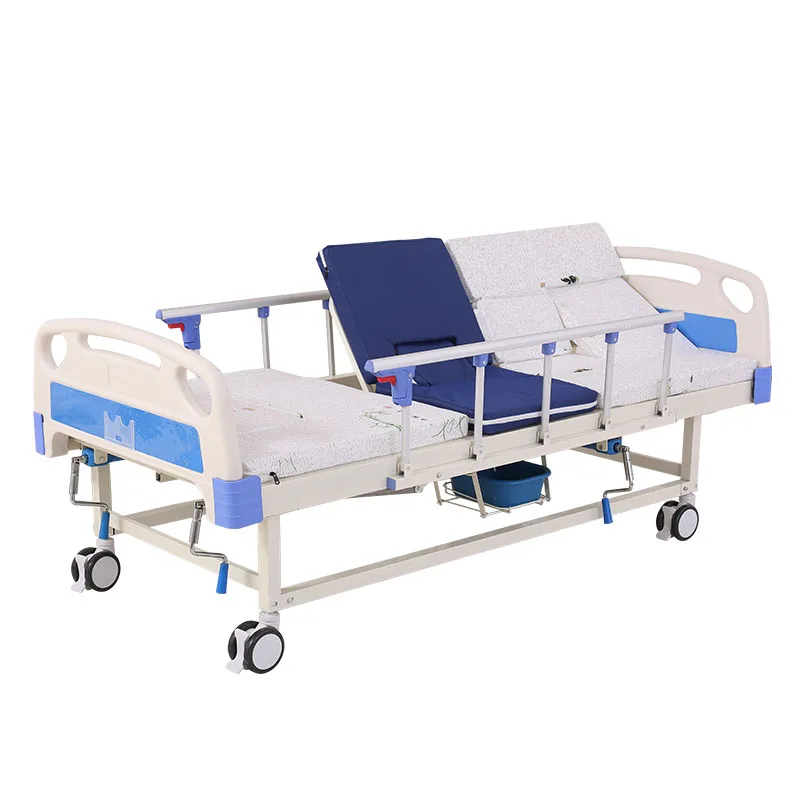 Manufacture cheap backrest semi bending homecare functions manual nursing bed with washbasin potty hole