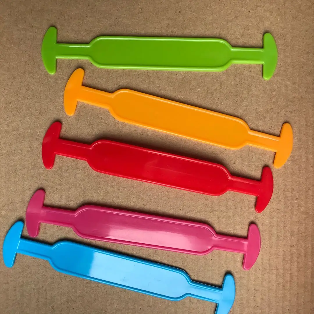 Plastic handles for small colored paper cartons can be used in carton boxes