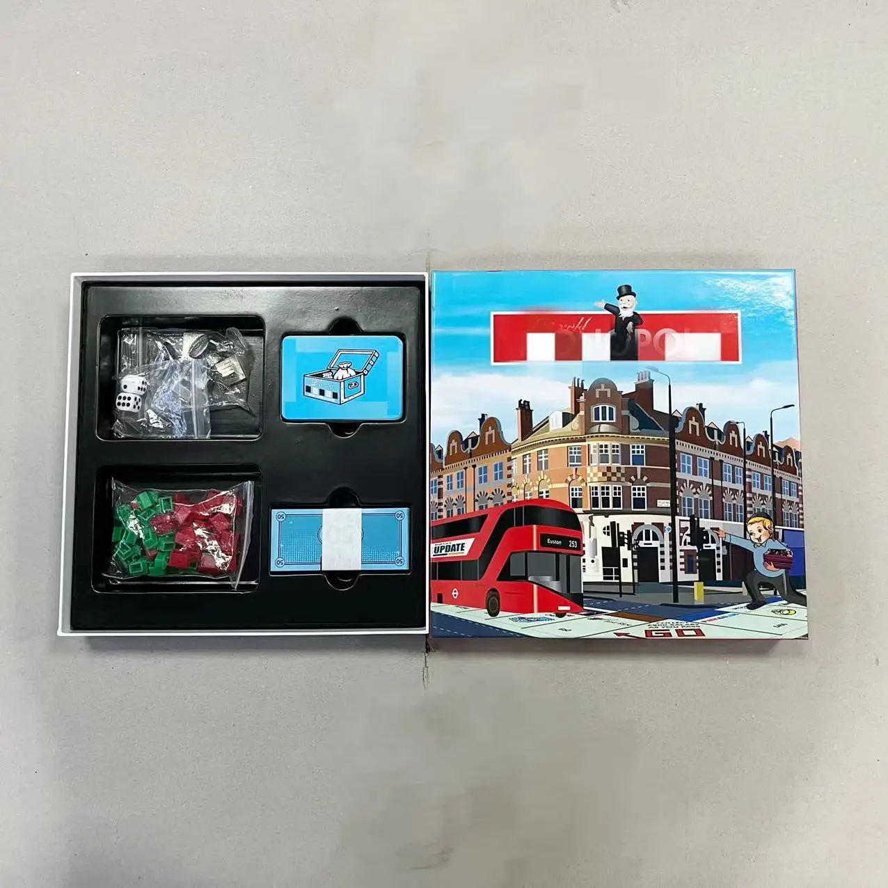 popular Custom board game supplier plastic house and metal miniature monopoli board games for fun