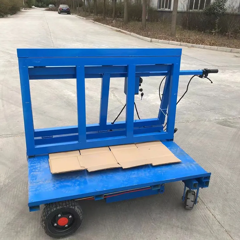 Chinese factory workers transport glass trucks electric trolley fitted with glass