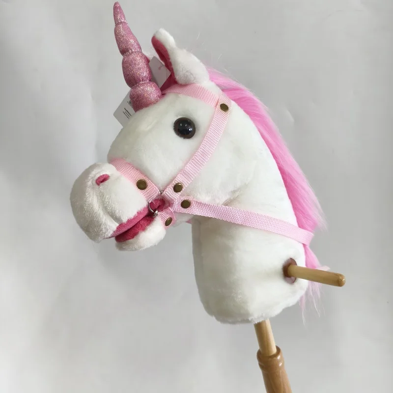plush hobby unicorn stick on the showing platform
