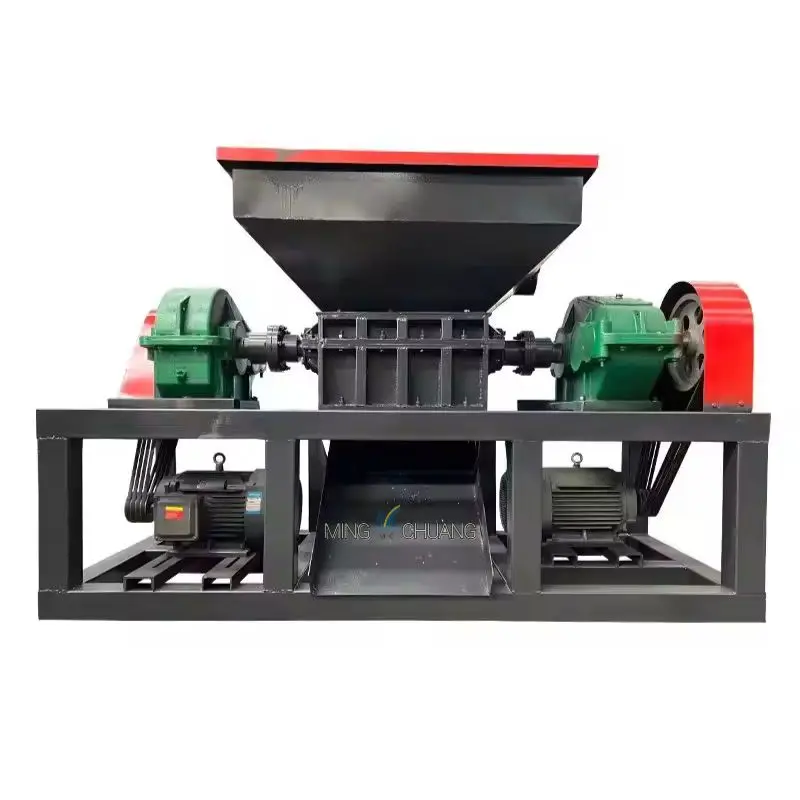Universal double-shaft shredder for recycling construction and renovation waste