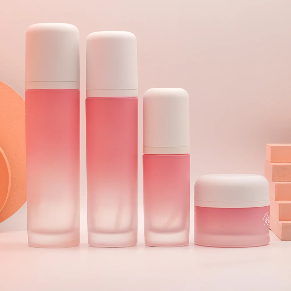 Christmas Custom Eco Friendly Luxury Pink Frosted Refillable Glass Pump Bottle And Jar Skincare Cosmetic Packaging Container Set