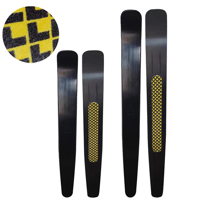 Wide backcounty skis with skin on bottom with step sole sliding  snowshoes