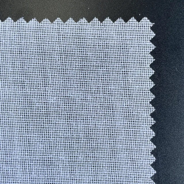 Buckram woven H hard hangfeeling double dot 100% Polyester top fuse interlining fabric for cap
