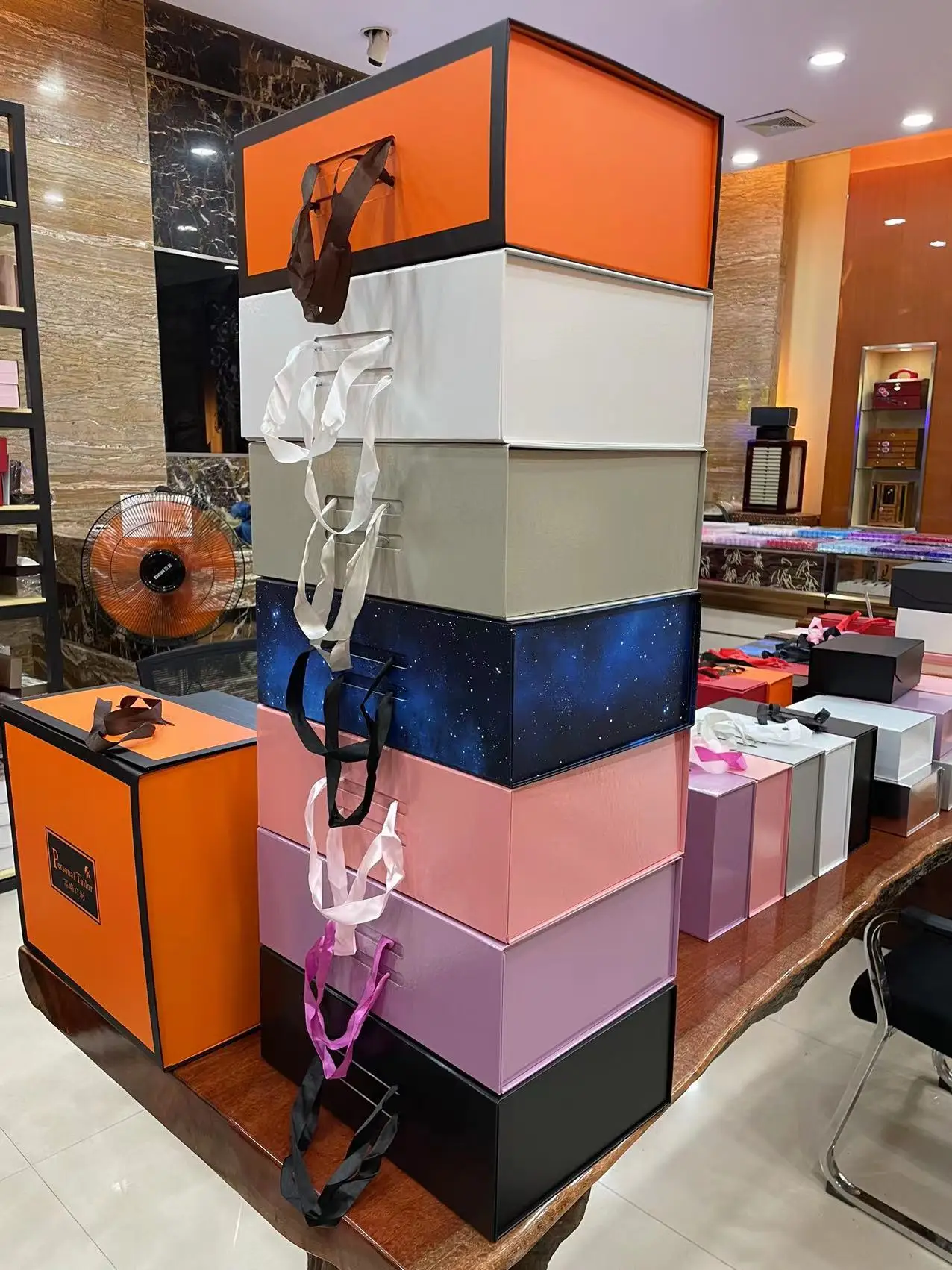 China Professional Manufacture Custom Luxury Gift Packaging Handle Orange Folding Gift Storage Paper Box