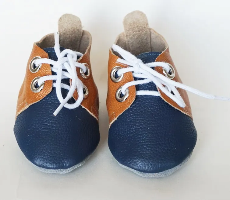 
XIAMEN COBRA 2021 top selling newest design soft sole leather baby moccasins shoes 