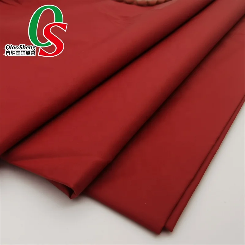 100%nylon downproof windproof water Repellent plain taffeta heavy cire oil calender fabric for down jacket warm cloth