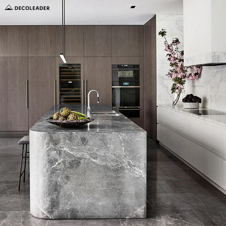 Luxury and modern kitchen cabinet designs featured wenge veneer finish and round-cornered marble island