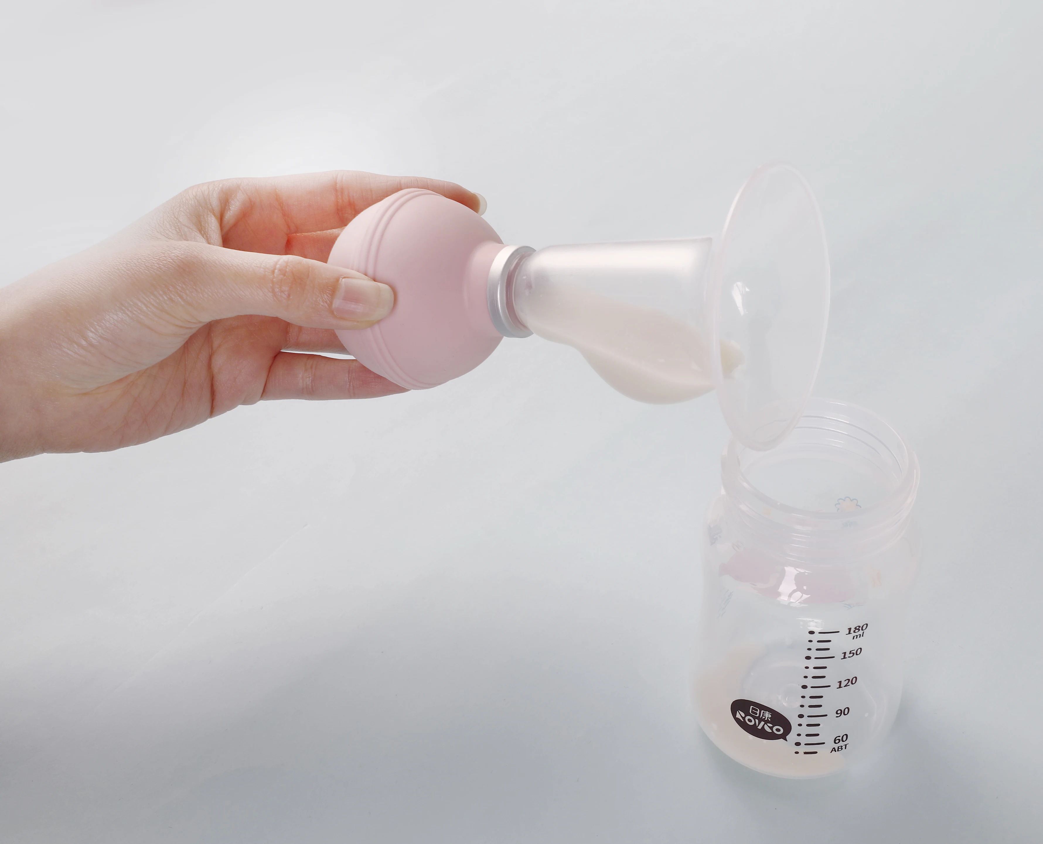 RK-3603 Custom Wearable hand Breast Pump Maternity Breast pump With Silicone Cup
