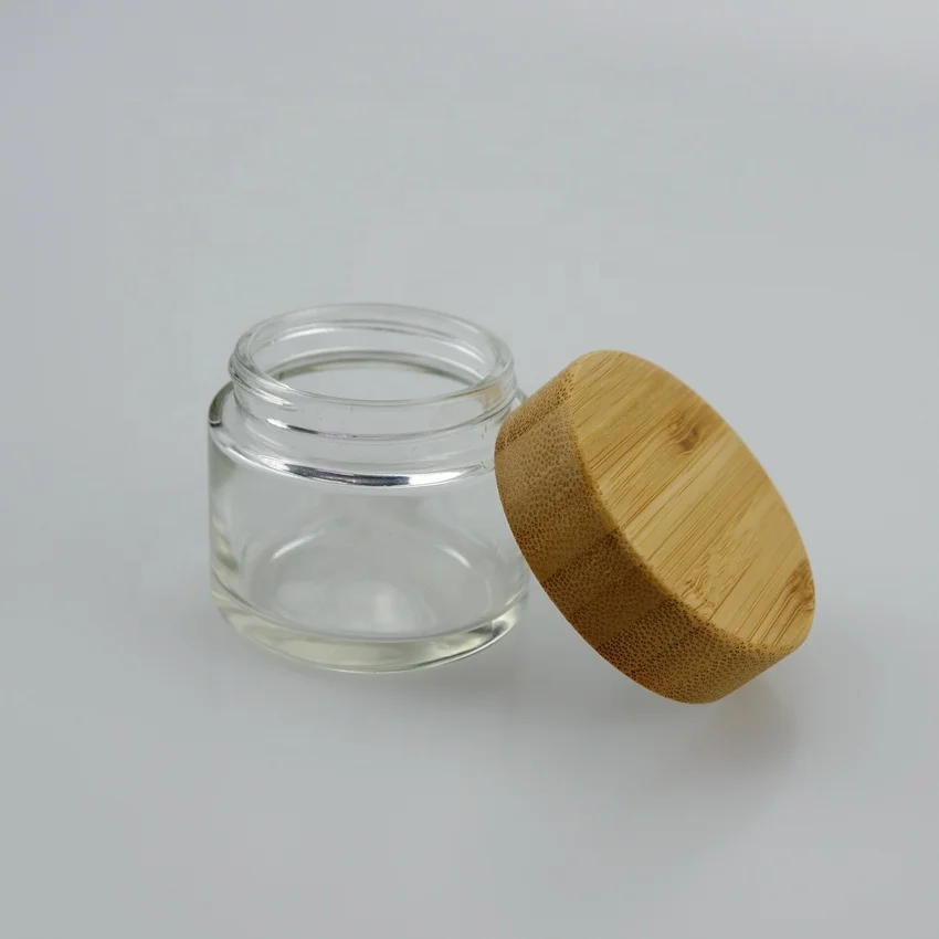 
Wholesale 1oz 2oz 3oz 4oz 5g 7g 9g child proof bamboo lid with glass jar/container with childproof lid 