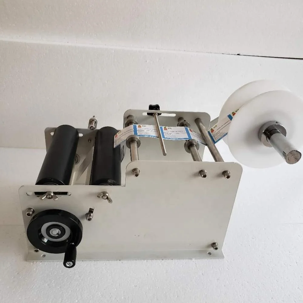 
YTK-L100 manual labeling machine round bottle labeling machine 