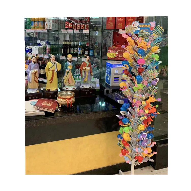 RUIMEI Rotating Candy Display Rack For Retail Store Yellow Candy Racks Display With Baskets For Supermarket Shop