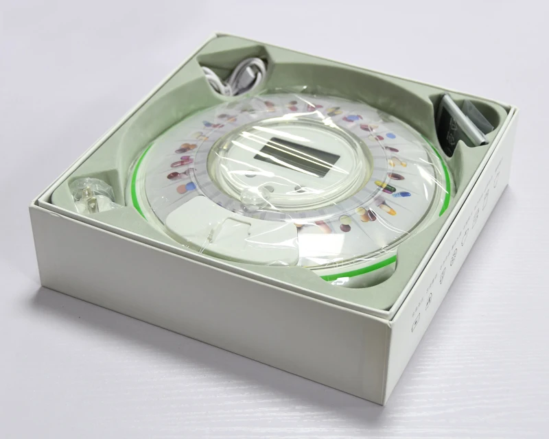 Plastic slide pill dispenser with voice alarm 28 compartment for elderly