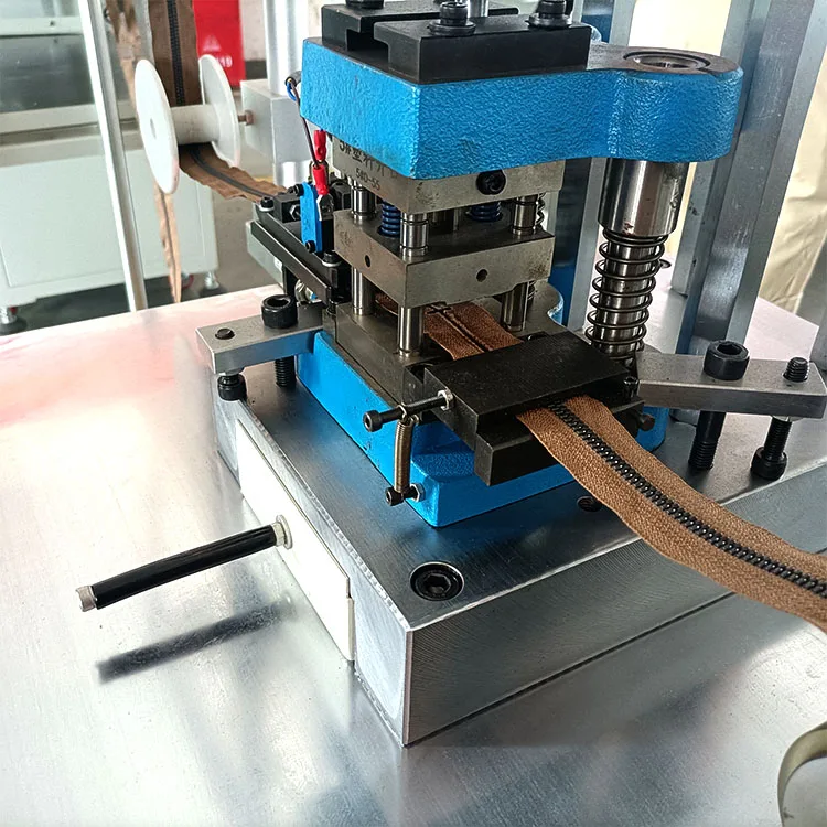 Plastic zipper product hole punching machine for resin garment zipper