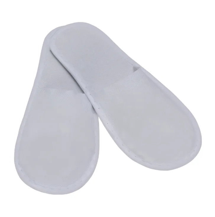 Wholesale manufacturer spot disposable slippers hotel supplies plush slippers air travel hotel room indoor non slip