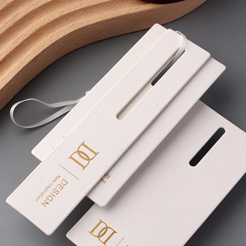 Custom Printing Brand Name Logo Clothing Out Swing Garment Labels Die Cut Hang Tag Embossed Paper Hangtags
