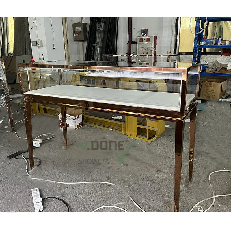 Luxury gold stainless steel jewelry display showcases led lights suppliers for jewelry counter shop showcase