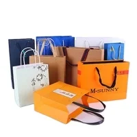 Custom Design Ribbon Handle Black Luxury Jewelry Cosmetic Gift Clothing Shopping Packaging 250 gsm Art Paper Bag For Clothes