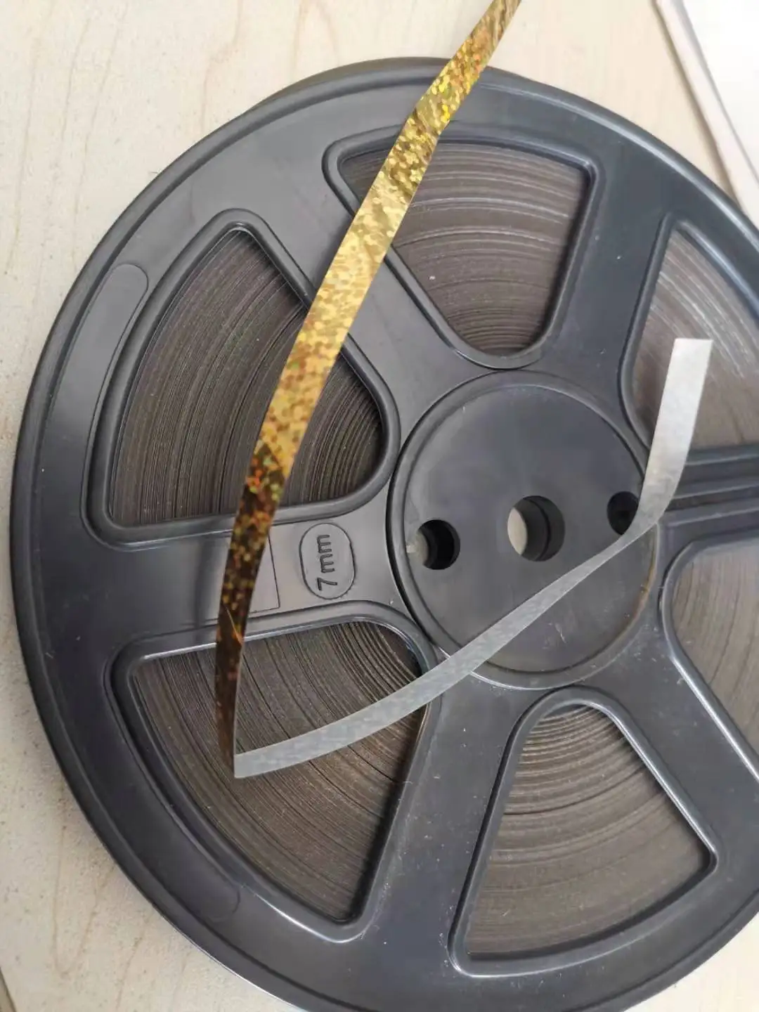 Hot fix sequin roll back with glue gold color size 6mm