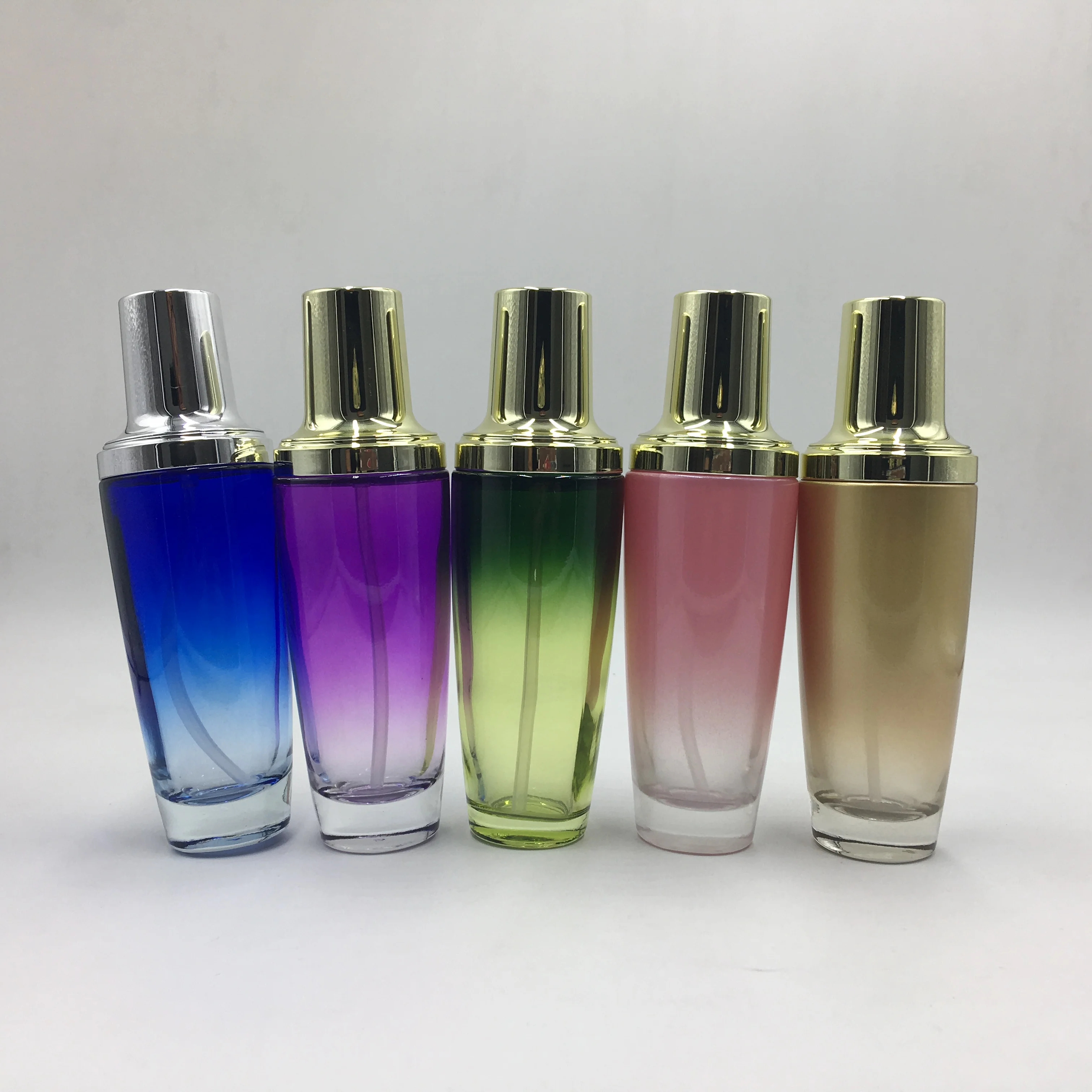 Luxury packaging transparent empty cosmetic sets glass bottle with pump