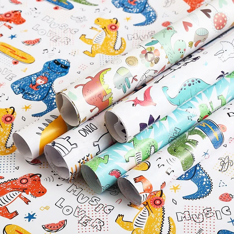 Wholesale Spot cheap spot 80 grams of coated paper boy dinosaur pattern gift paper 50x80cm