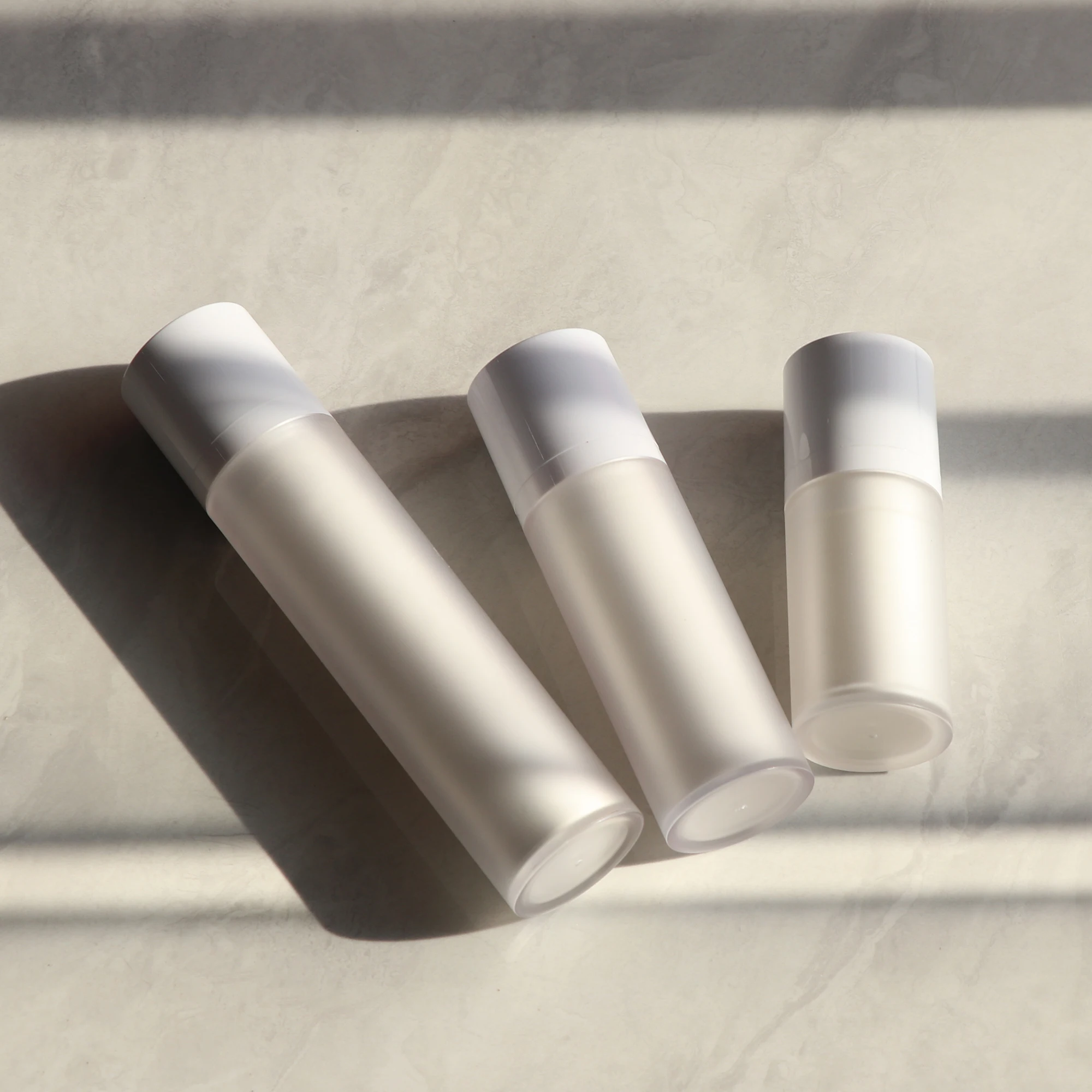 In stock white cosmetic empty lotion containers 30ml 50ml 80ml 100ml  pet airless twist pump bottle