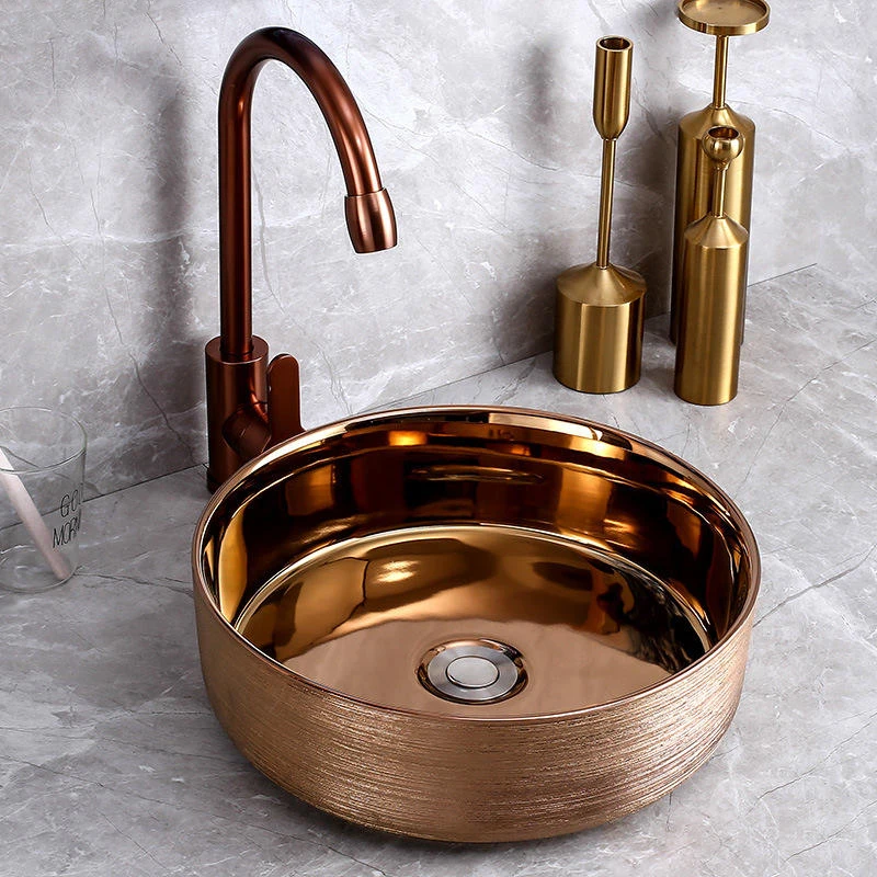 Modern novel design round small plating rose gold black color luxury countertop ceramic sink art washbasin hand wash basin