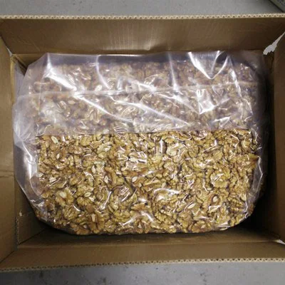 Minimum price high quality paper skinned extra light walnut kernels halves walnut supplies
